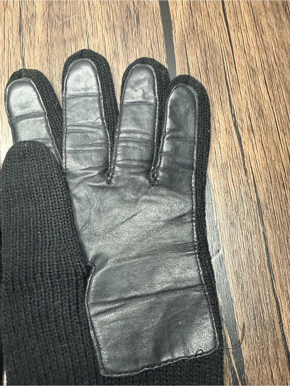 Vintage long black knit gloves featuring a textured cuff
